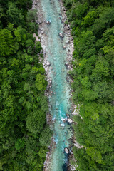 Emerald Soca river in Slovenia , aerial drone to down view