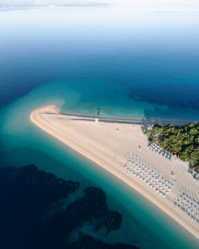 Aerial view of a beautiful white sand beach paradise surrounded by torquoise waters, Croatia vacation destination - Golden Horn, Brac island.