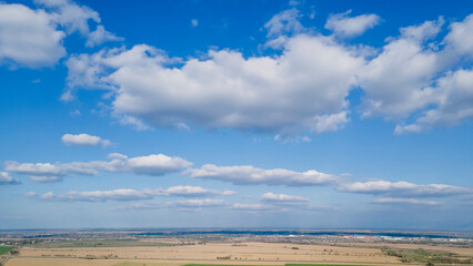 Cloudy sky over agricultural fields