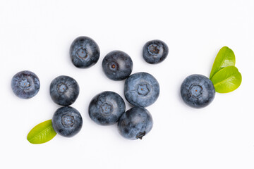 Blueberry isolated. Blueberries with leaves on white. Blueberries on a white background. Full depth of field.