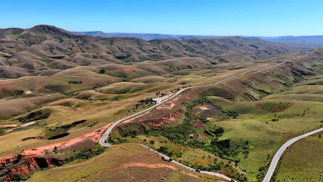 A beautiful African landscape with a winding highway from Antananarivo to Mahajanga, Madagascar