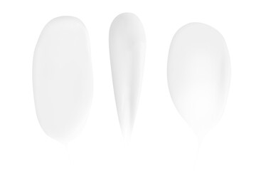 A set of different strokes of white cream on a blank background. PNG
