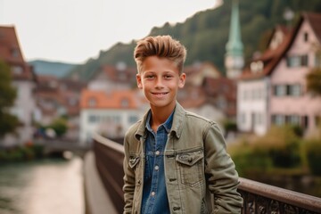 Studio portrait photography of a satisfied mature boy wearing a denim jacket against a quaint european village background. With generative AI technology