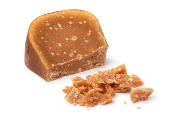 Piece of artisanal very old Dutch  goat cheese isolated  on white background close up