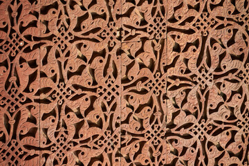 Wall decorative patterns of Qutb complex in South Delhi, India, close up ancient bas relief wall decorations of mosque ruins landmark, popular touristic spot in New Delhi, ancient indian architecture