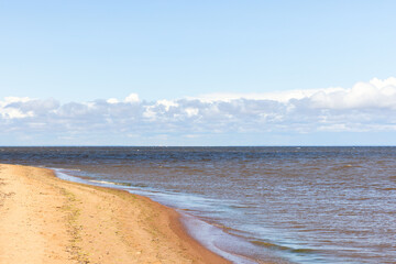 Fototapeta na wymiar Baltic sea coast. Natural landscape with sand and shore water
