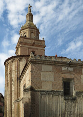Fototapeta premium Church of Santo Domingo. Arevalo. Spain. (12th to 16th century). Lateral view of the bell tower and the medieval Mudejar apse.