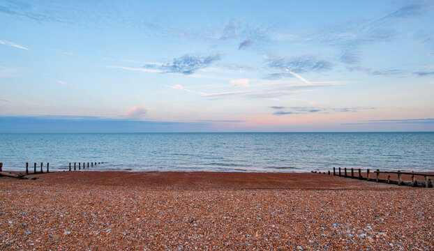 Clouds at sunset at Pevensey Bay beach