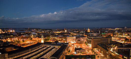 Lights from Helsinki train station and city center on summer night