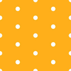 Bright yellow seamless pattern with white polka dots