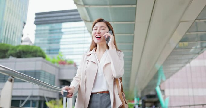 Asian business woman use mobile