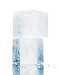 Ice blocks in a cube form, stacked on a mirror surface, isolated on white background.