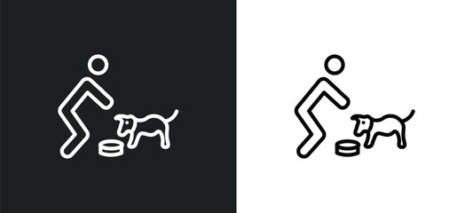 feeding a dog icon isolated in white and black colors. feeding a dog outline vector icon from people collection for web, mobile apps and ui.