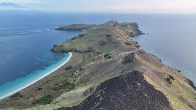 The volcanic island of Gili Banta, not far from Komodo National Park, is surrounded by healthy coral reefs. This beautiful area of Indonesia is known for its astounding marine biodiversity.