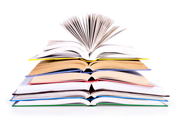 Stack of open books on a white background.