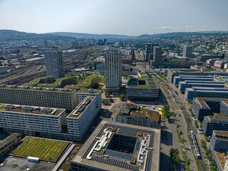 Aerial view of City of Zürich industrial district with skyline and cityscape on a sunny spring day. Photo taken May 28th, 2023, Zurich, Switzerland.