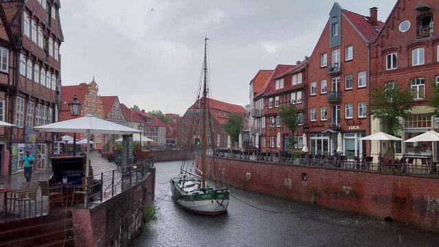 Rain on embankment historical center of Hanseatic city Stade, Lower Saxony, Germany, Europe July 12, 2023. High quality 4k footage