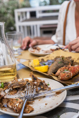 Fish bones are left after finishing the meal at the restaurant