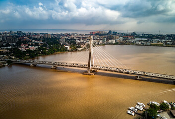 An aerial image of overhead Lekki-Ikoyi link bridge and the lagoon, Lagos, Nigeria