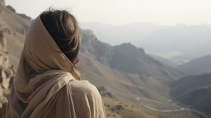ai generative back view of arabic woman with a wild mountain as background 