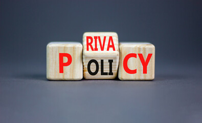 Privacy policy symbol. Concept words Privacy policy on wooden block on a beautiful grey table grey background. Business and privacy policy concept. Copy space.