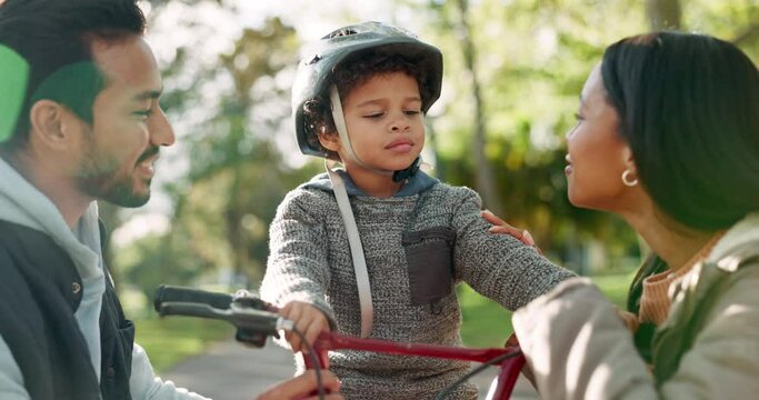 Helmet, bicycle and parents with child in park for cycling, having fun and adventure outdoors. Happy family, nature and mother, father and son with safety gear for riding bike, learning and training