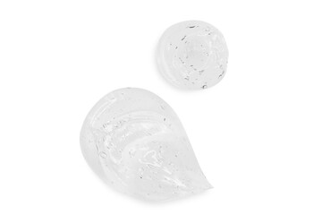 Composition of smears and drops or drops of a transparent gel, serum. On an empty transparent background.