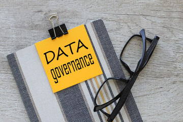 note paper. text on a sticker on a notepad data governance
