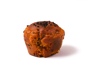 Vegetable muffin with unsweetened filling on a white plate, or snack cake with sun-dried tomatoes, cheese, oregano