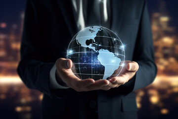 Businessman holding a digital globe in his hand