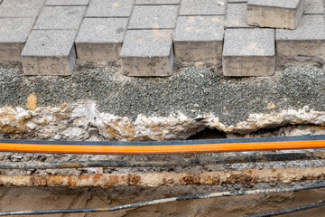 cables under paving stones during construction work