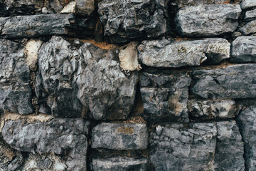 Old gray stone wall as background