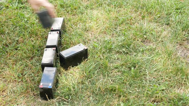 The symbol for the lead acumulator Pb in the periodic table is made up of individual cells on the grass
