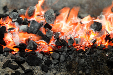 A charcoal fire in a Charcoal kettle grilling usually used for grilling meat and marinated beef...