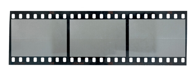 long 35mm filmstrip with empty frames isolated, drag and drop your content under the film material....