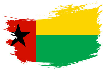Guinea-Bissau brush stroke flag vector background. Hand drawn grunge style Republic of Guinea-Bissau isolated banner