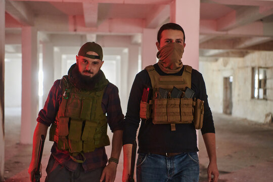 An abandoned building serves as the stronghold for a team of terrorists, fiercely guarding their occupied territory with guns and military equipment