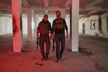 An abandoned building serves as the stronghold for a team of terrorists, fiercely guarding their occupied territory with guns and military equipment