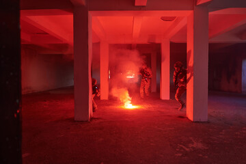  A group of professional soldiers bravely executes a dangerous rescue mission, surrounded by fire...