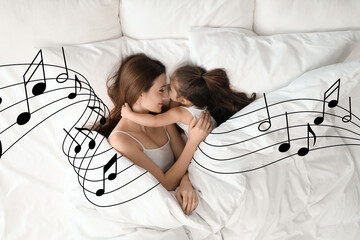 Mother singing lullaby to her sleepy daughter in bed, top view. Illustration of flying musical...