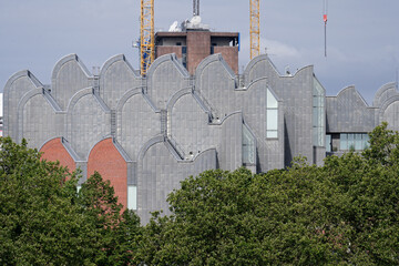 striking shed roof backdrop of the museum ludwig on the banks of the rhine in the old town of...
