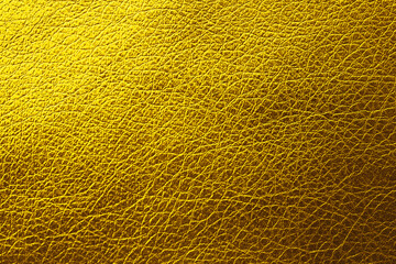 Golden textured surface as background, closeup view