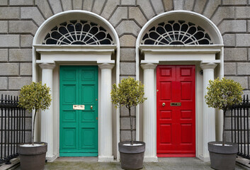 Front door of elegant old townhouses used as professional offices - 623620197