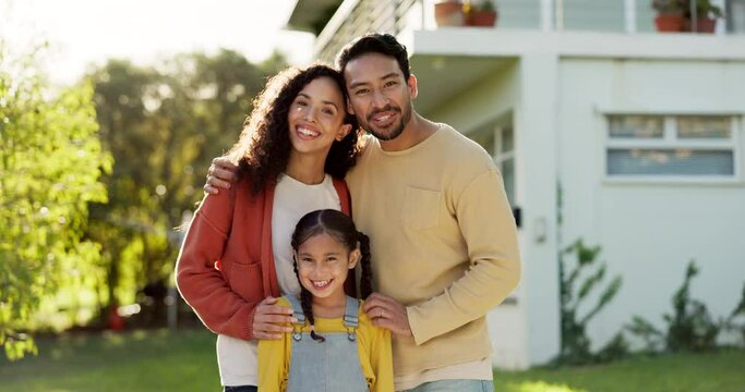Family outdoor, parents and child on lawn at home with smile in portrait, bonding with love and care. Happiness, nature and sunshine, woman and man with young girl spending time together and trust