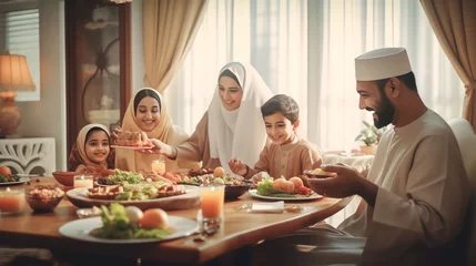 Foto op Aluminium Muslim family eating food and enjoying together in happiness in the living room © Salsabila Ariadina