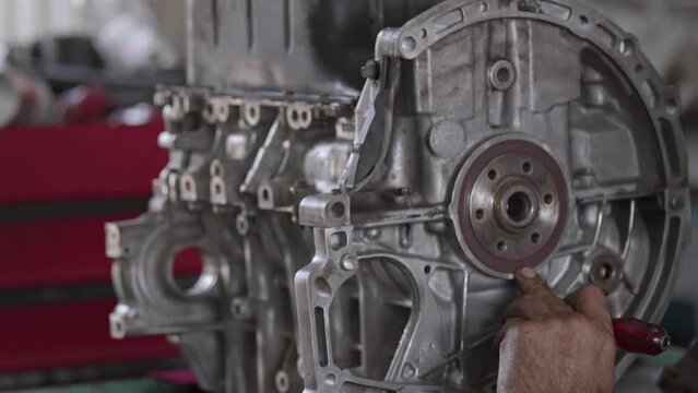 Flywheel Repair of Car Engine in Repair Shop Footage.