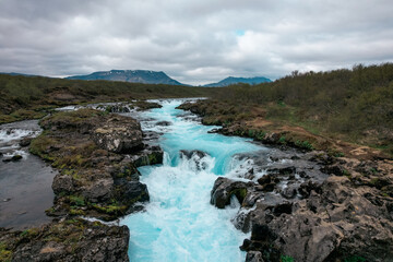 Fototapeta na wymiar Aerial view of Midfoss Waterfall and landscape in Iceland