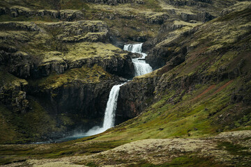 Fototapeta na wymiar Waterfall along the Öxi Pass, Eastfjords, Iceland