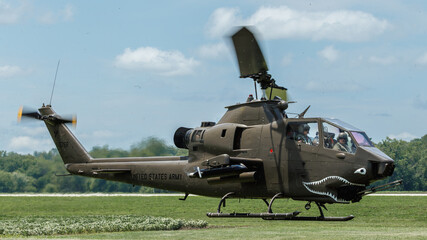 Fototapeta na wymiar Cobra attack helicopter close up of landing approach