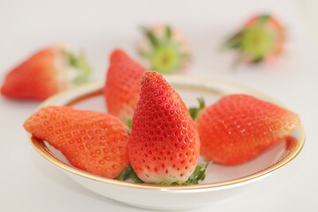 The garden strawberry is a widely grown hybrid species of the genus Fragaria, collectively known as the strawberries, which are cultivated worldwide for their fruit.